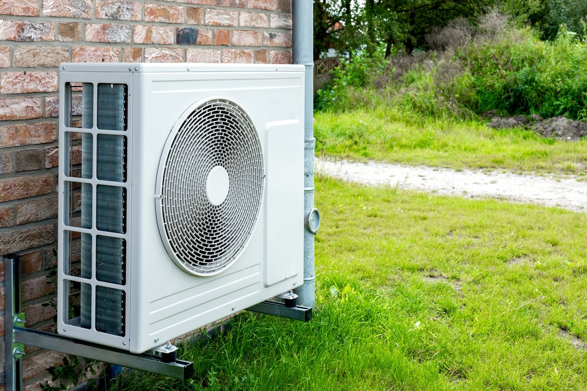 Heat pump outdoor unit installed at residential home